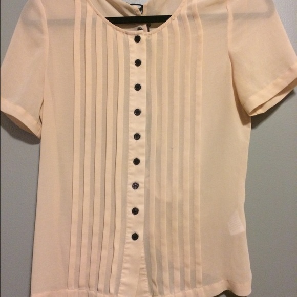 Beautiful blush blouse with pleats and lace up