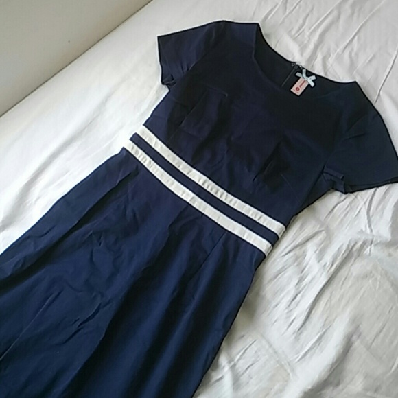 NWOT Navy blue dress with white stripes.