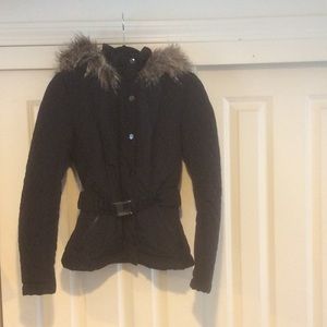 Cropped fitted jacket with fake fur trimmed hood.