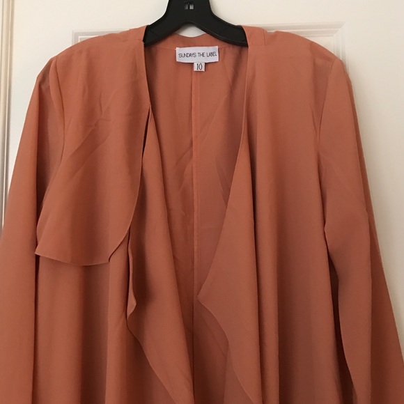 Long sheer jacket in a beautiful rust color. - Picture 2 of 4