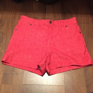 High waisted red-orange shorts