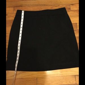 Loft black mini curvy skirt.