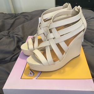 Cream wedge heels