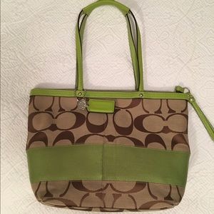 Coach purse with green accent