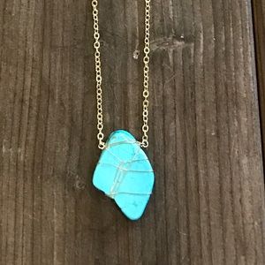 Faux gold necklace with turquoise stone