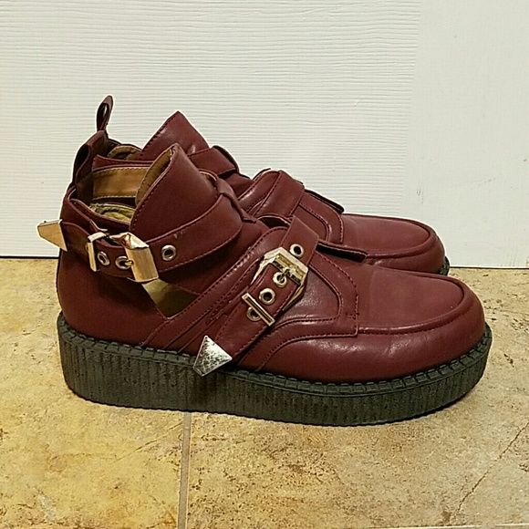 Cut-out platform shoe with buckled detailing