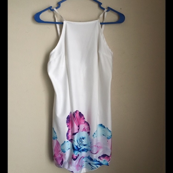 White Silk Dress, says xl fits like small/medium.