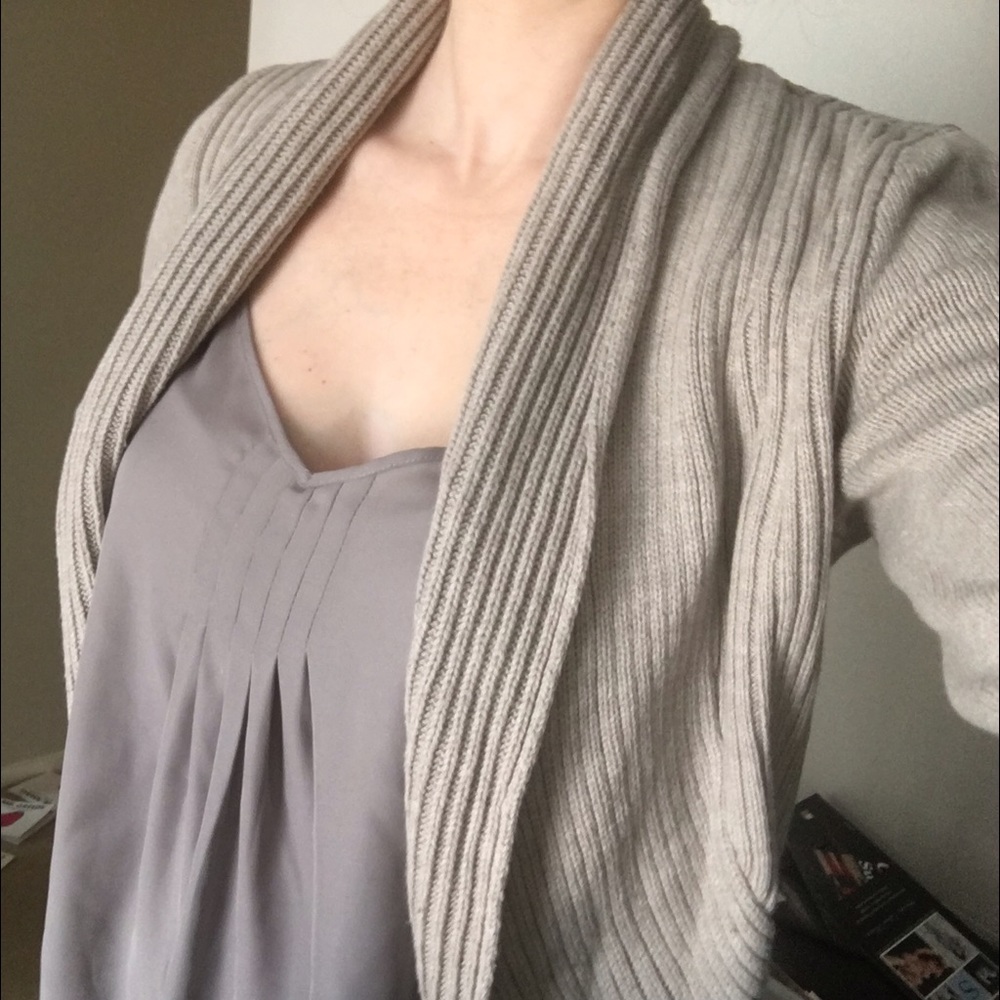 Taupe knit sweater.
