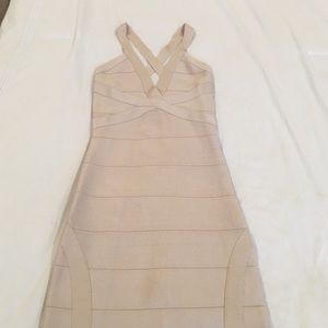 Bebe bodycon bandage dress, beige color. Like new