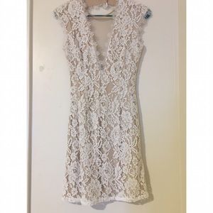 Beautiful lace open backed cocktail dress.