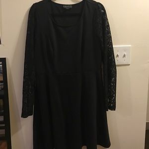 Black skater dress with mesh sleeves