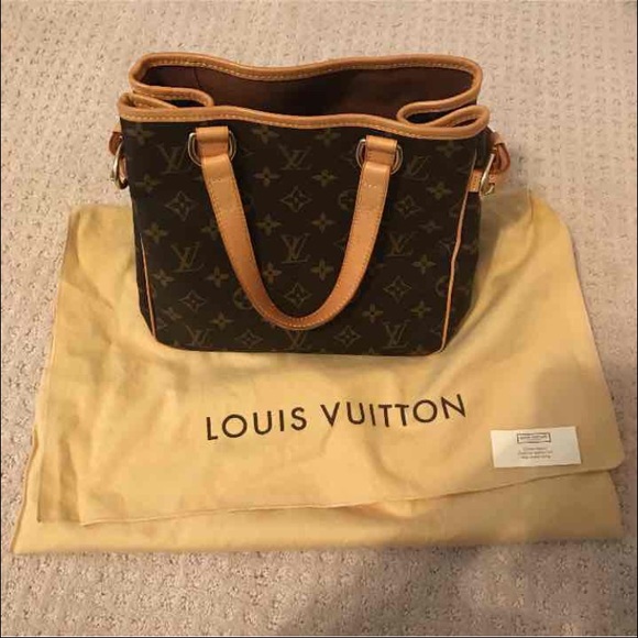 Authentic Louis Vuitton.