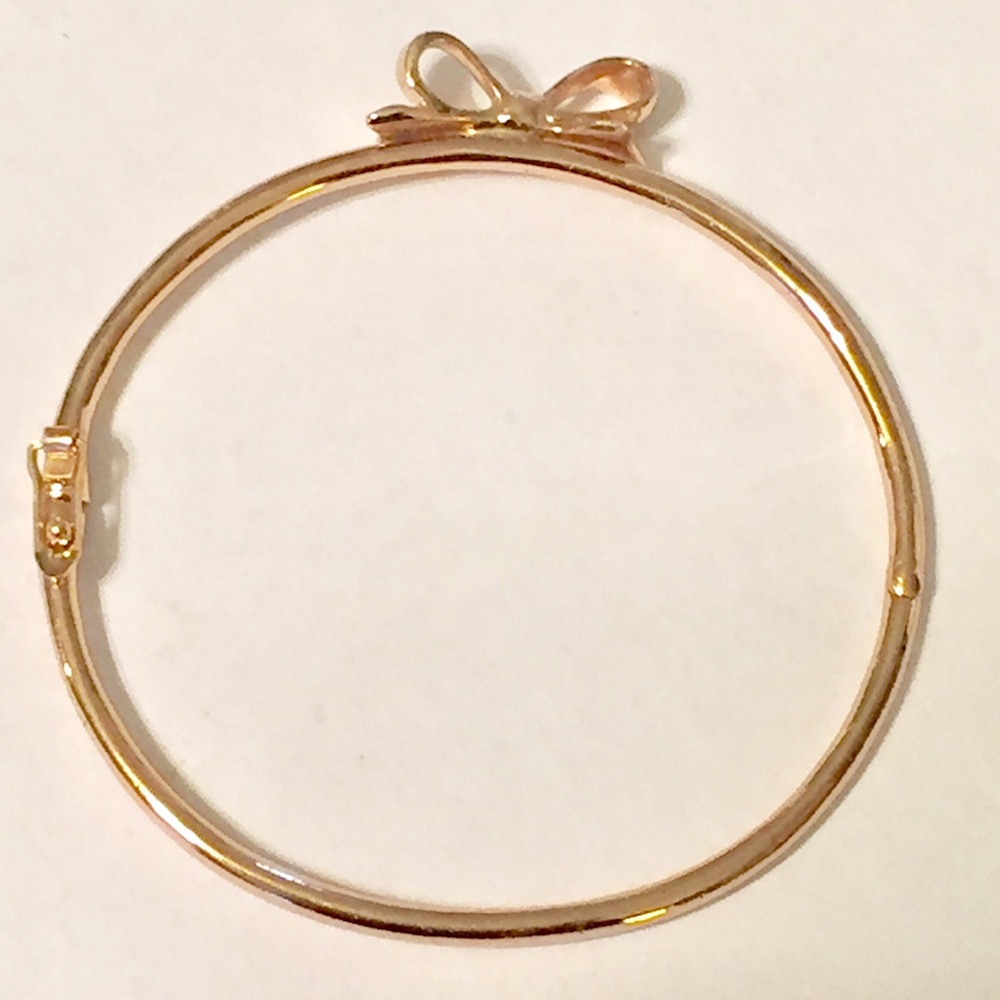 Kate Spade, Rosegold bow bracelet.