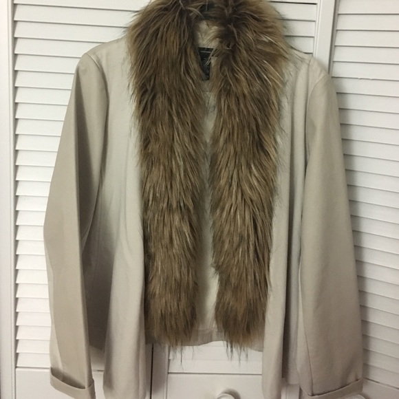 Women's leather/vinyl jacket with fur collar