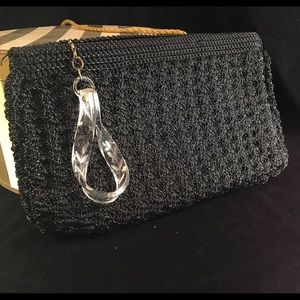 Vintage clutch with unique handle