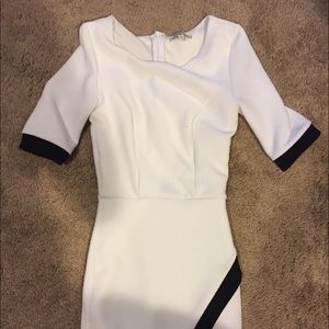 White bodycon dress with black trim