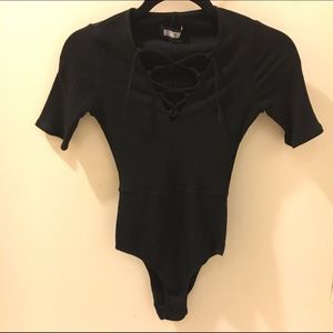 REFORMATION short sleeve lace-up bodysuit