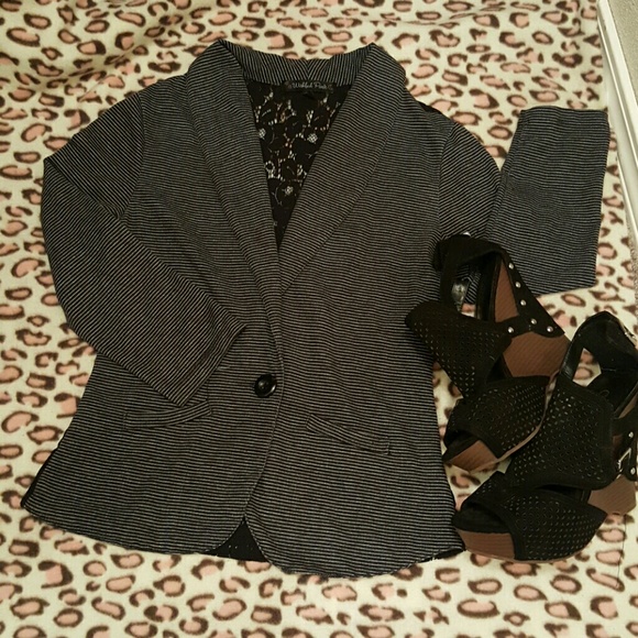 Striped vest with lace detail in the back!