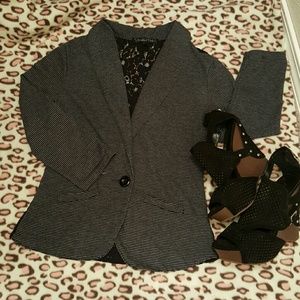 Striped vest with lace detail in the back!