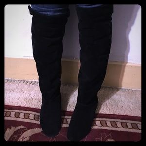 Steve Madden blondes over the knee suede boots.