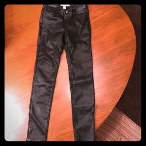 Black faux leather mid to high waist pants