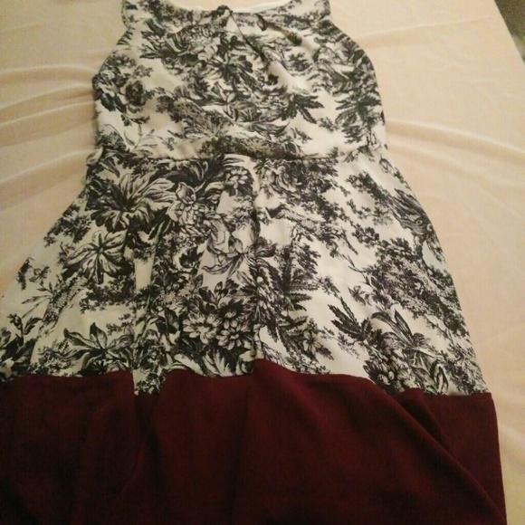 A ModCloth floral dress with a Burgundy trim.