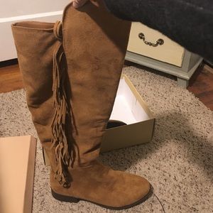 Knee high tassel boots