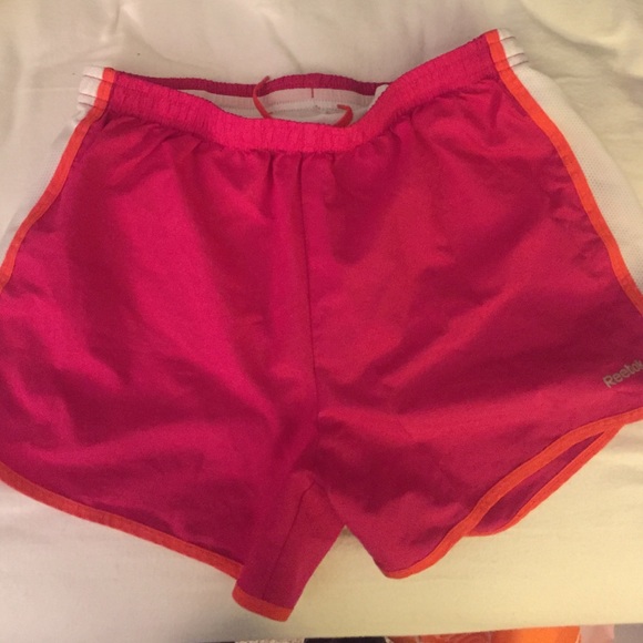 Pink running shorts