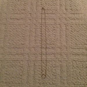 Gold plated Karma circle necklace