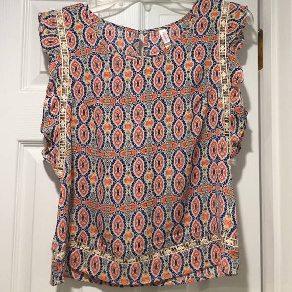Festive blouse w/ button up neck & frilly sleeves!