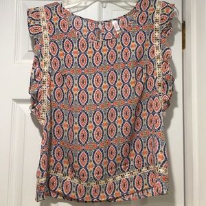 Festive blouse w/ button up neck & frilly sleeves!