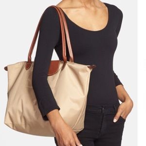 Longchamp 'Large Le Pliage' Tote beige.