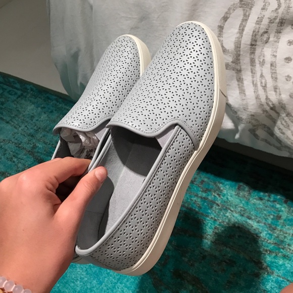 Grey perforated slip-ons