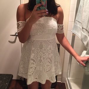 White lace dress with cuff sleeves
