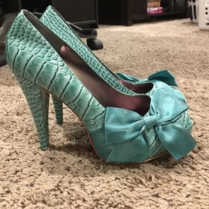 Turquoise Paris Hilton bow heels