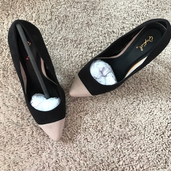 Black heels with taupe toe
