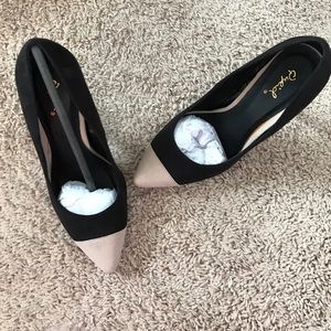 Black heels with taupe toe