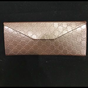 Gucci Sunglass case.