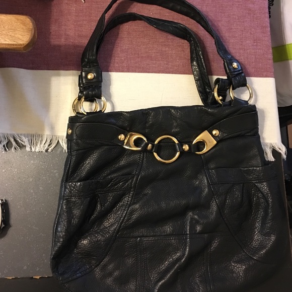 B. Makowsky black leather handbag