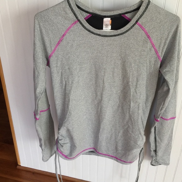 Lucy exercise top. Size M. NWOT. Never been worn.