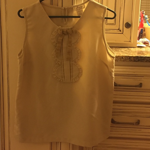Freeway size L top with bow and ruffle detail