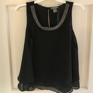 Black sleeveless blouse with beading detail