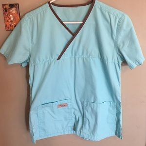 Urbane Scrubs size small. Turquoise and brown
