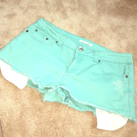 Bright turquoise short shorts