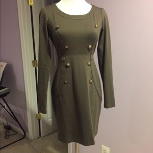 Long sleeve, beige/ gray dress with buttons.