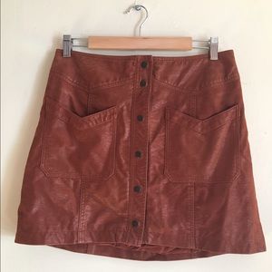 Brown, faux leather button skirt. Free people