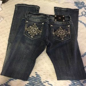 NWOT Mid-rise boot cut miss me jeans size 27