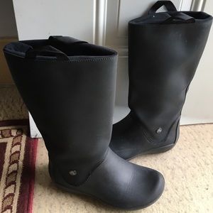 Selling Crocs rain boots.