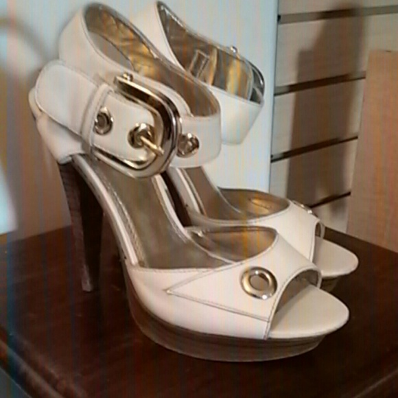 White with silver buckles Bebe size 7m heels