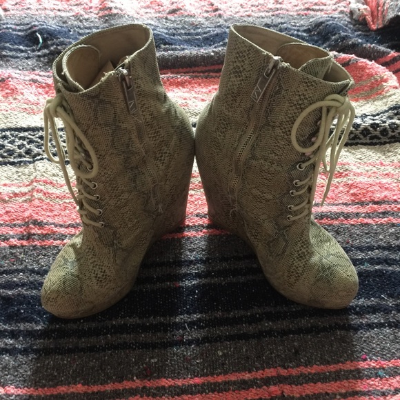 Matiko snakeskin embossed boots